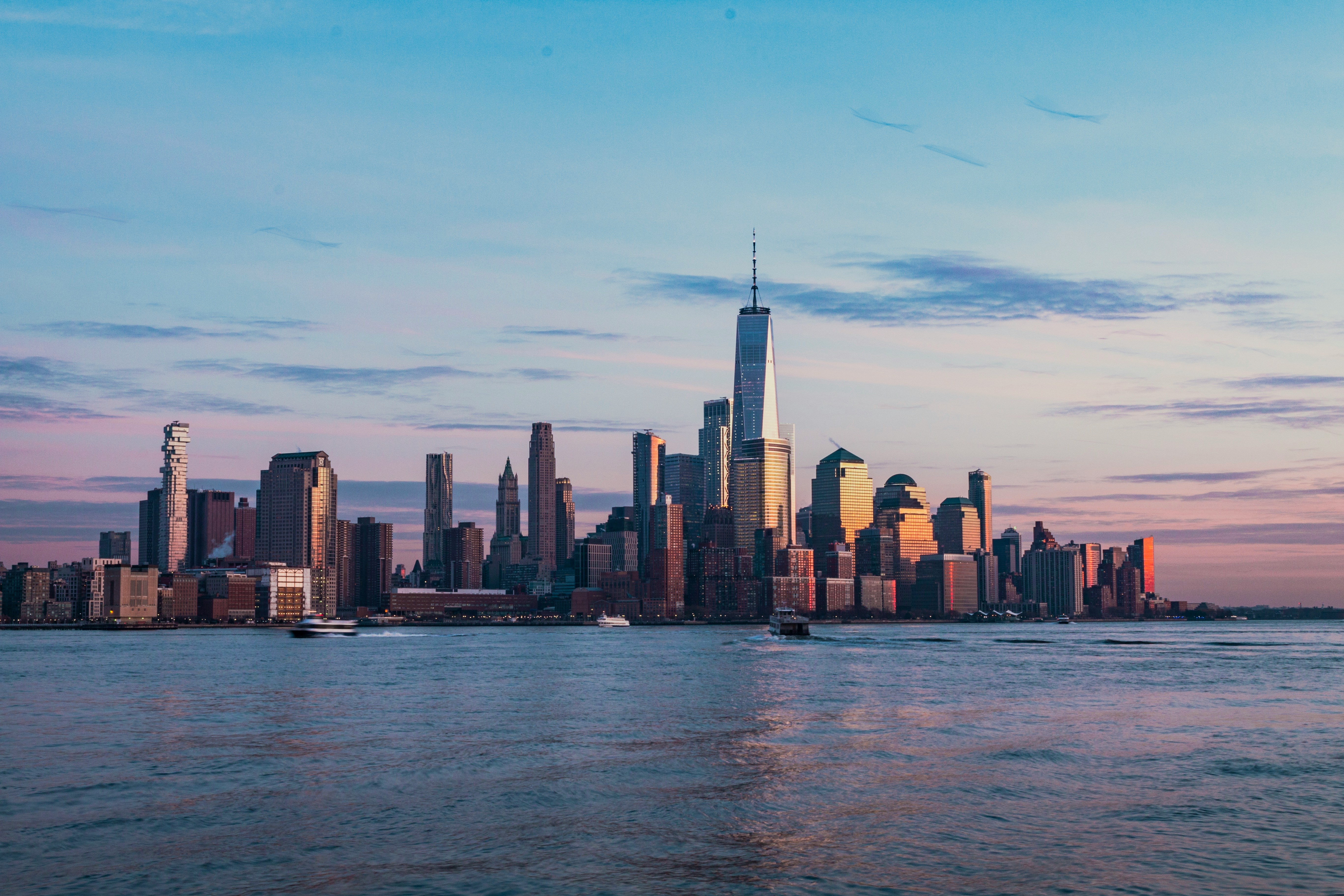 City skyline across the water at golden hour